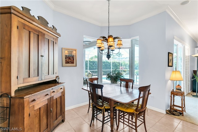 dining space featuring plenty of natural light, an inviting chandelier, and light tile flooring