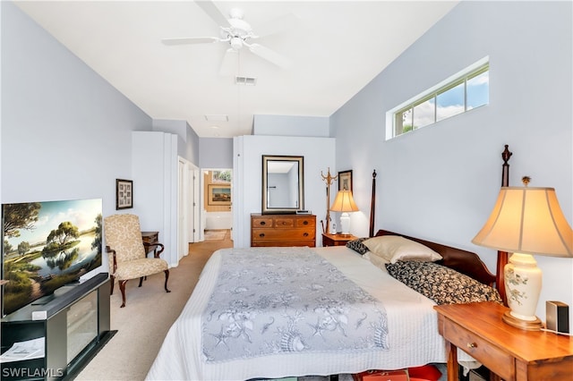 bedroom with ceiling fan and light colored carpet