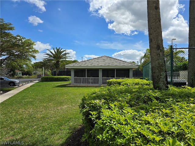 view of property exterior with a yard