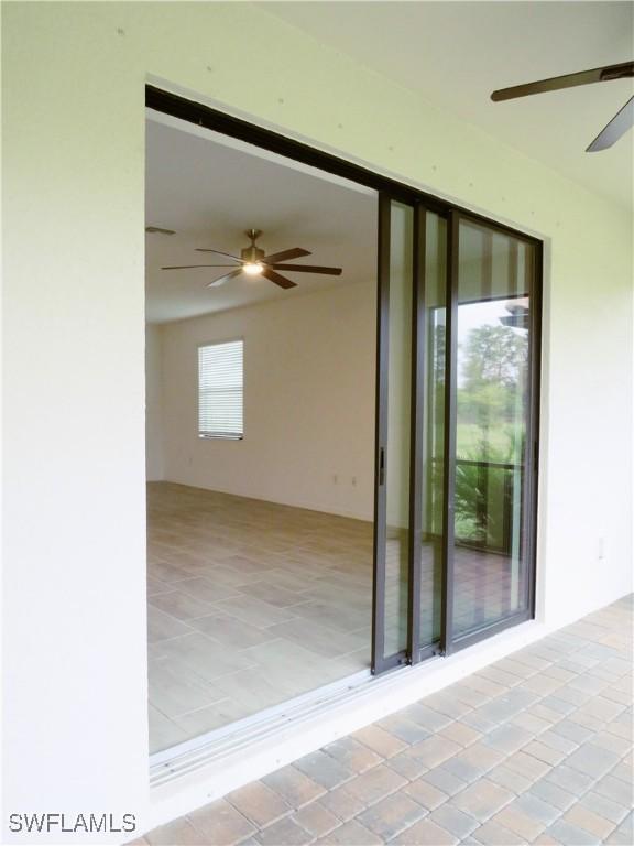 view of patio with ceiling fan