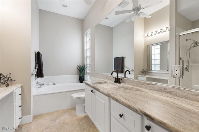 full bathroom with vanity, tile patterned floors, ceiling fan, toilet, and independent shower and bath