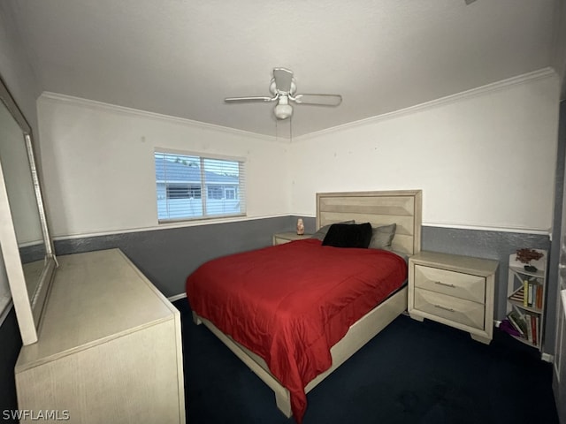 bedroom with ornamental molding and ceiling fan