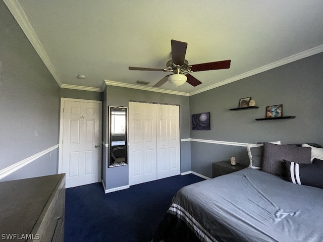 bedroom featuring crown molding, a closet, ceiling fan, and dark colored carpet