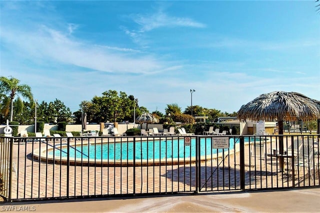 view of swimming pool with a patio area