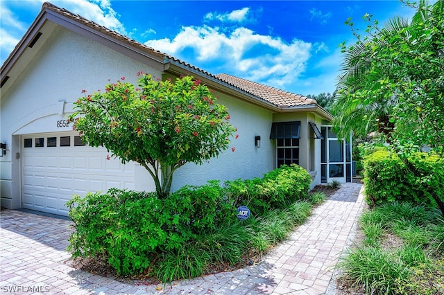 view of home's exterior featuring a garage