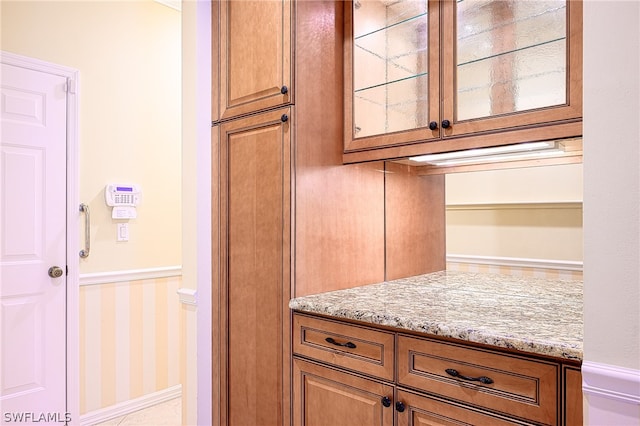 kitchen featuring light stone countertops