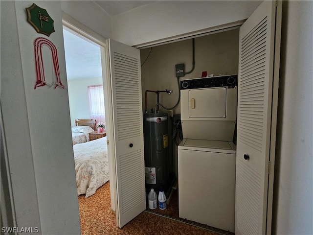 clothes washing area with stacked washer and dryer, water heater, and dark carpet