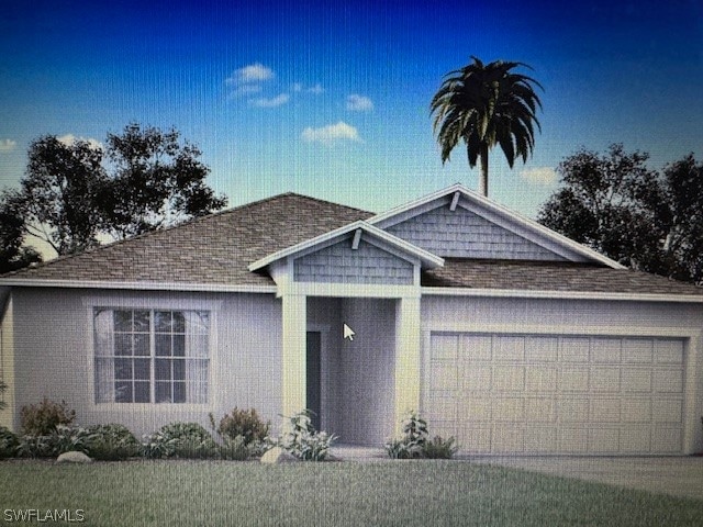 view of front of home with a garage