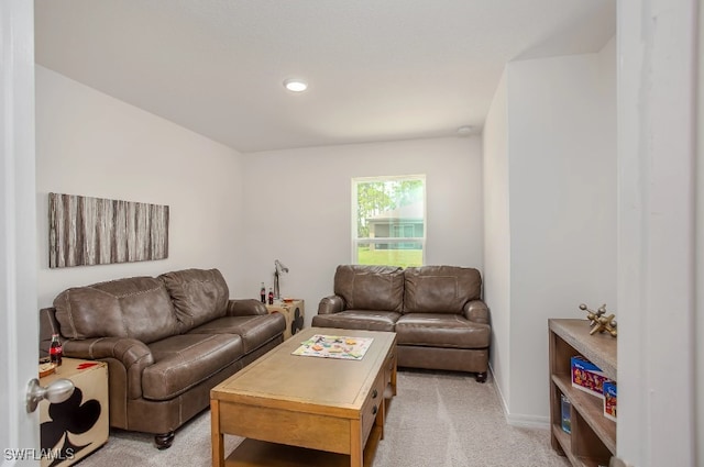 living room featuring light carpet