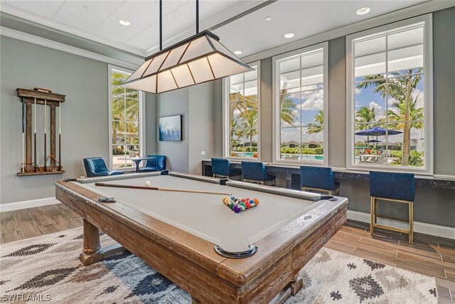 recreation room with crown molding and pool table