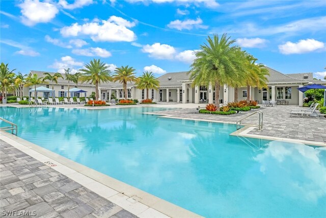 view of swimming pool featuring a patio area