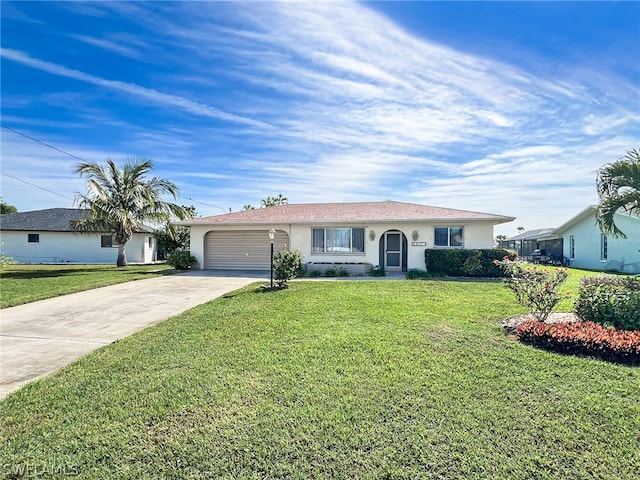 ranch-style home featuring a garage and a front lawn