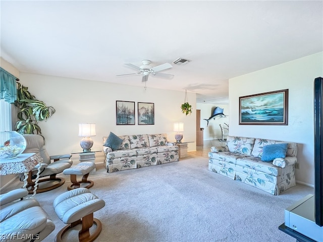 living room with light colored carpet and ceiling fan