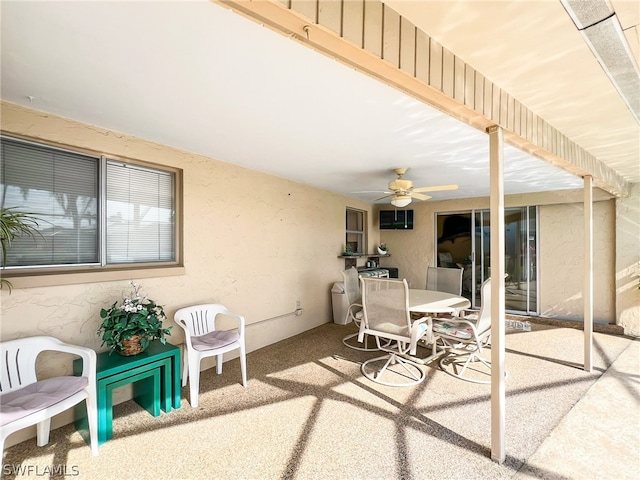 view of patio featuring ceiling fan