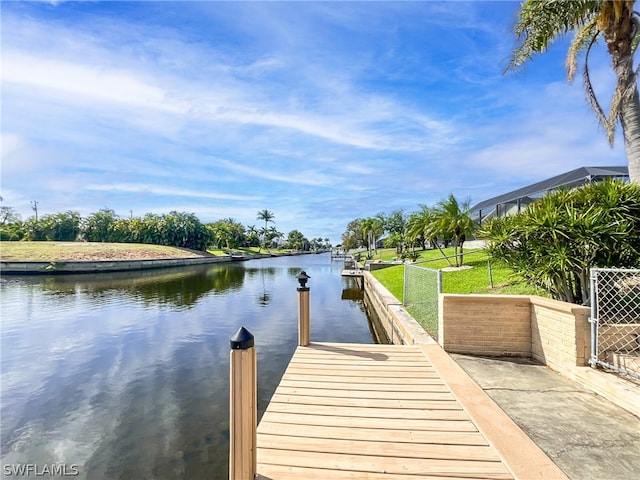 dock area with a water view