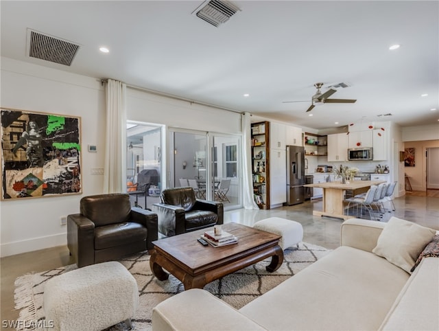 living room featuring ceiling fan