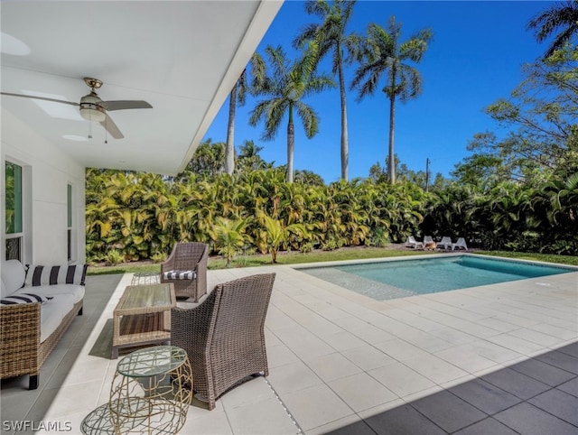 view of swimming pool featuring an outdoor hangout area, ceiling fan, and a patio