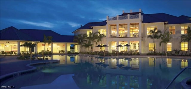 view of swimming pool featuring a patio area
