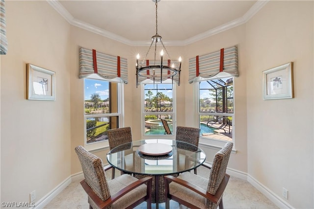 dining room featuring an inviting chandelier, ornamental molding, and a healthy amount of sunlight