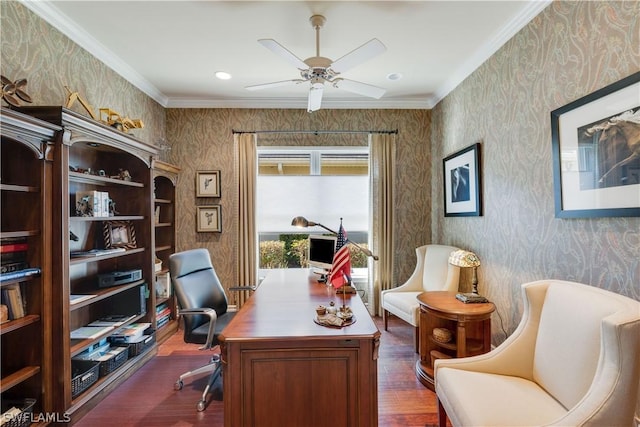 home office featuring dark hardwood / wood-style flooring, ornamental molding, and ceiling fan