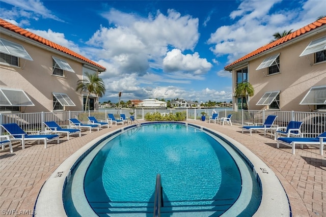 view of pool featuring a patio area