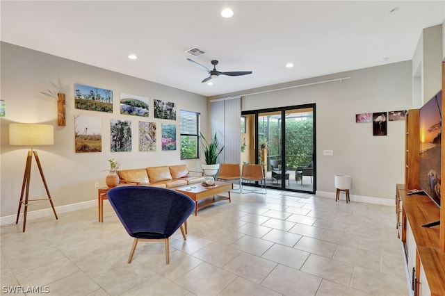 living room with baseboards, visible vents, ceiling fan, and recessed lighting