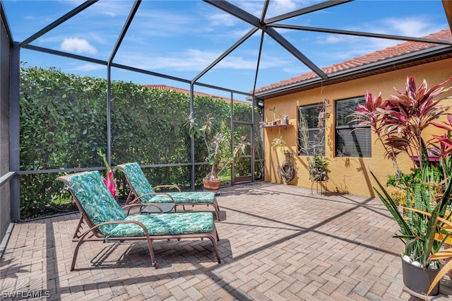 view of patio / terrace with glass enclosure