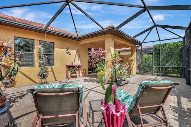 view of patio / terrace with a lanai