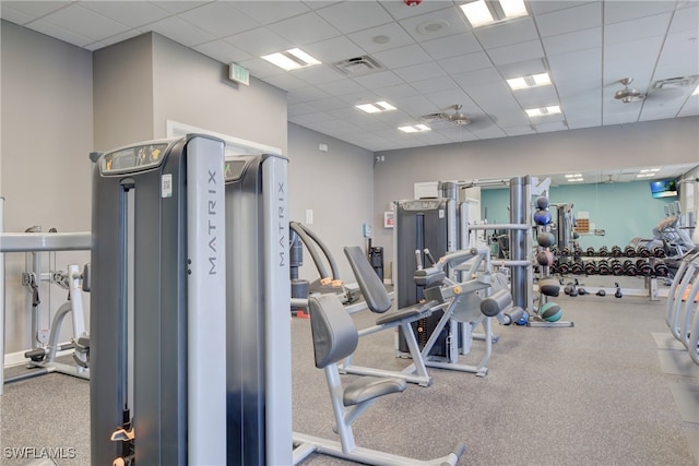 workout area featuring visible vents and a drop ceiling