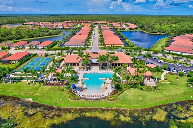 aerial view with a water view and a residential view