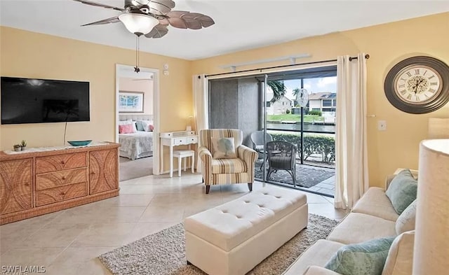 tiled living room with ceiling fan