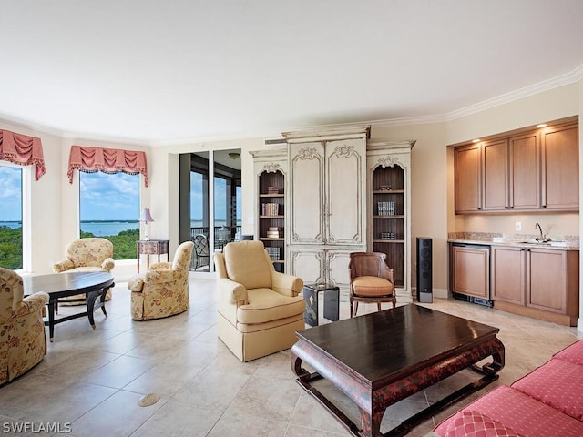 tiled living room with crown molding and sink