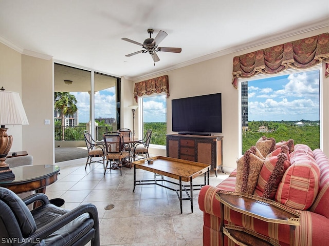 living room featuring ceiling fan and ornamental molding