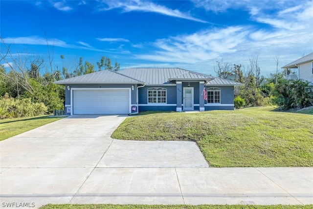 ranch-style house featuring a front lawn and a garage