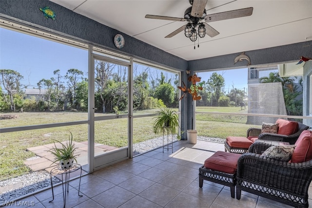 sunroom / solarium with ceiling fan