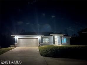 view of front of house with a garage