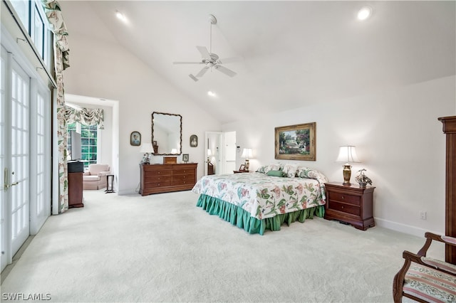 carpeted bedroom with high vaulted ceiling and ceiling fan