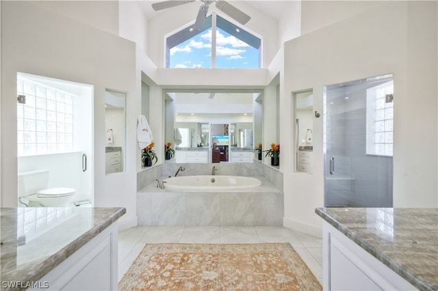 full bathroom featuring tile patterned floors, vanity, ceiling fan, high vaulted ceiling, and shower with separate bathtub