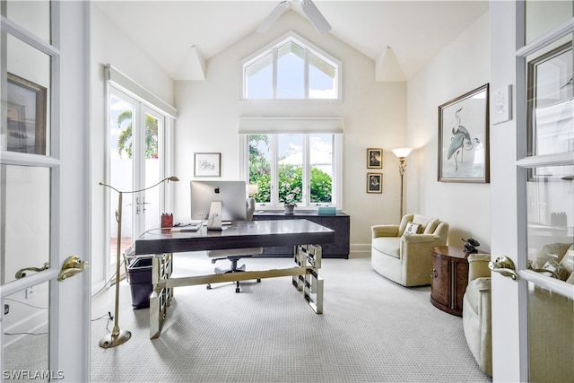 home office featuring carpet, french doors, and high vaulted ceiling