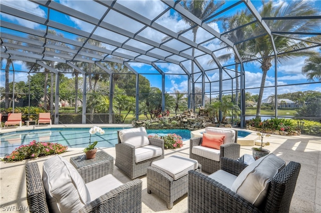 exterior space featuring outdoor lounge area and glass enclosure