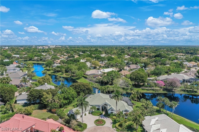 drone / aerial view with a water view