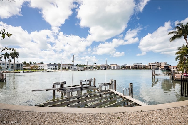 view of dock featuring a water view and boat lift