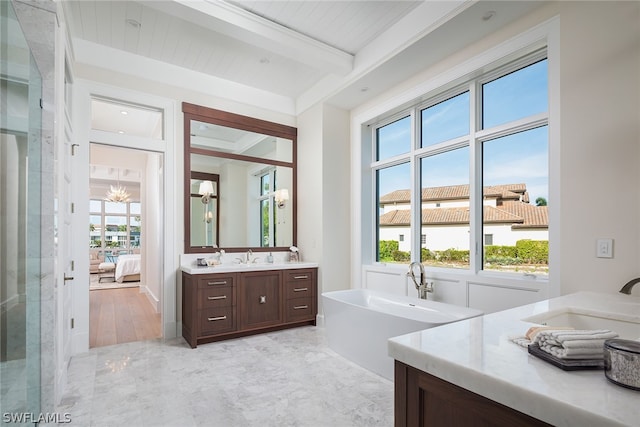 ensuite bathroom featuring a soaking tub, ensuite bath, beamed ceiling, vanity, and a chandelier