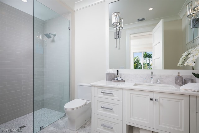 bathroom with visible vents, toilet, ornamental molding, vanity, and a walk in shower