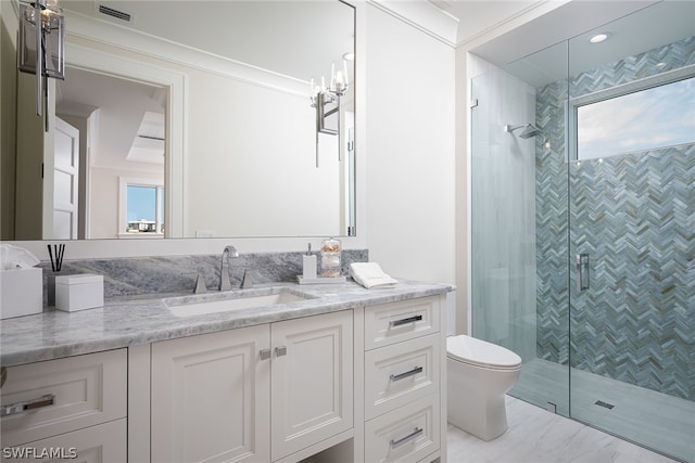 full bath with visible vents, a shower stall, toilet, and vanity