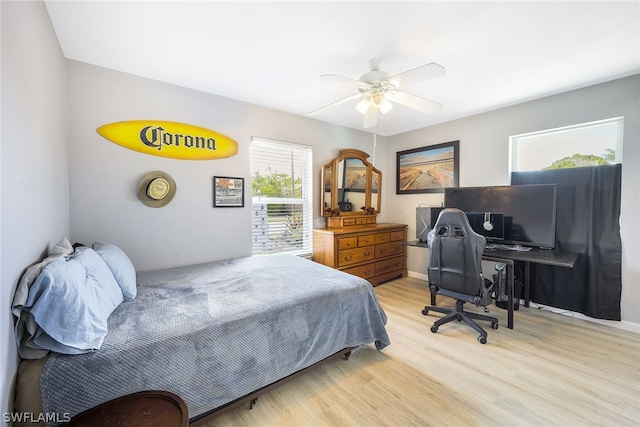 bedroom featuring ceiling fan and light wood-type flooring