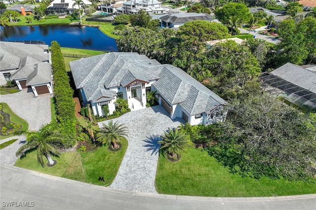 drone / aerial view with a water view