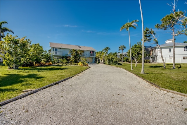 exterior space featuring a front lawn