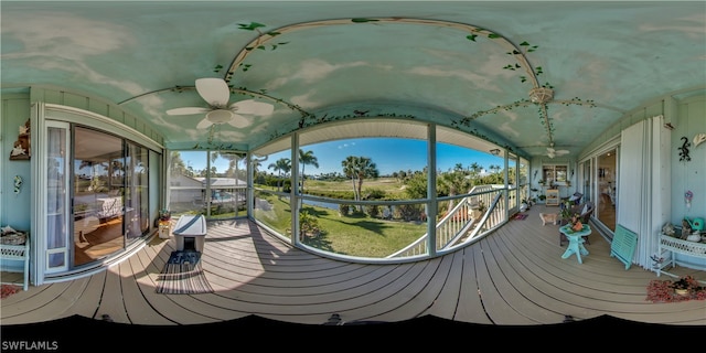 wooden terrace featuring ceiling fan