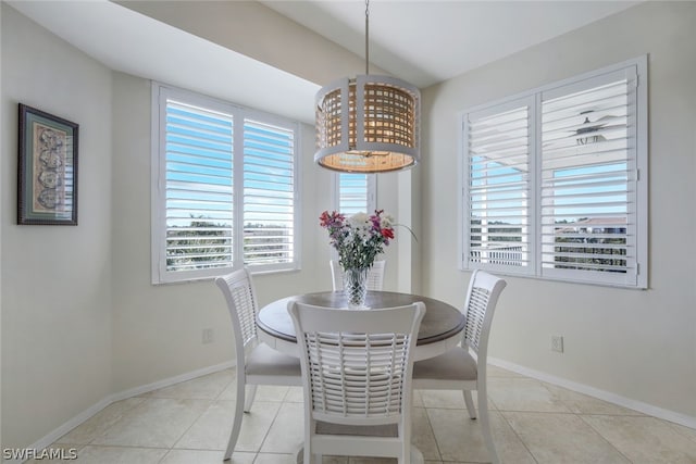 dining room with light tile floors